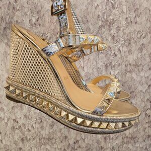 Christian Louboutin gold wedge shoes